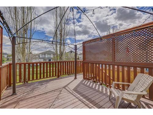 117 Rocky Ridge Cove Nw, Calgary, AB - Outdoor With Deck Patio Veranda With Exterior