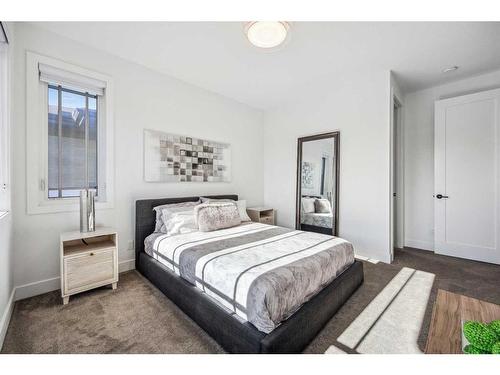 152 Rock Lake View Nw, Calgary, AB - Indoor Photo Showing Bedroom