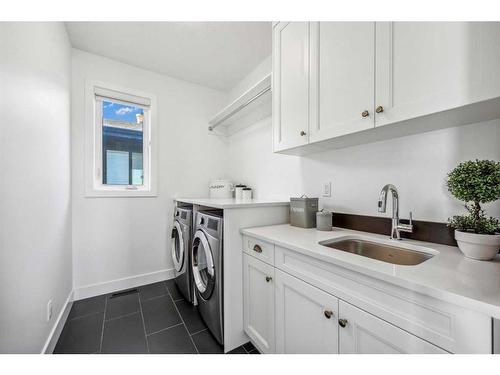 152 Rock Lake View Nw, Calgary, AB - Indoor Photo Showing Laundry Room