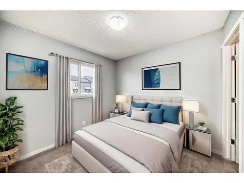 39 Walden Terrace Se, Calgary, AB - Indoor Photo Showing Bedroom