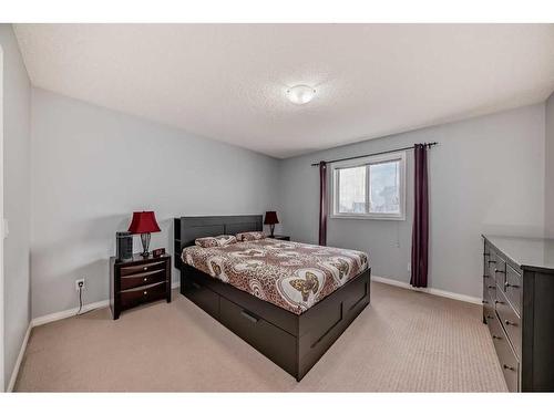 250 Cougar Plateau Mews Sw, Calgary, AB - Indoor Photo Showing Bedroom