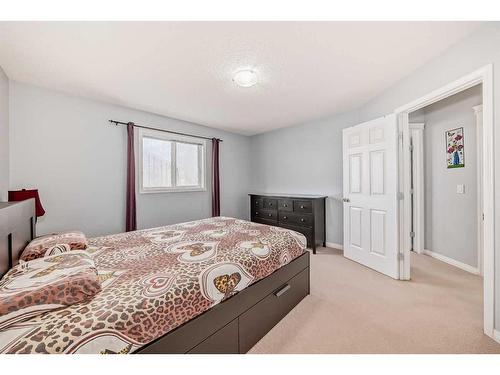 250 Cougar Plateau Mews Sw, Calgary, AB - Indoor Photo Showing Bedroom