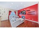 250 Cougar Plateau Mews Sw, Calgary, AB  - Indoor With Fireplace 