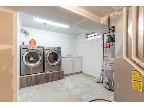 244 Dovely Place Se, Calgary, AB - Indoor Photo Showing Laundry Room