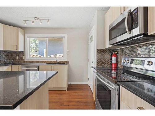 63 Templeridge Close Ne, Calgary, AB - Indoor Photo Showing Kitchen With Upgraded Kitchen
