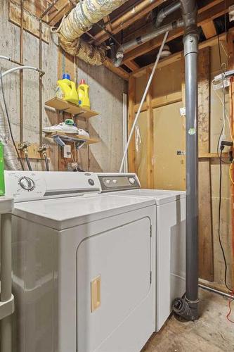63 Templeridge Close Ne, Calgary, AB - Indoor Photo Showing Laundry Room