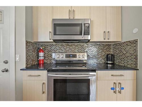 63 Templeridge Close Ne, Calgary, AB - Indoor Photo Showing Kitchen With Upgraded Kitchen