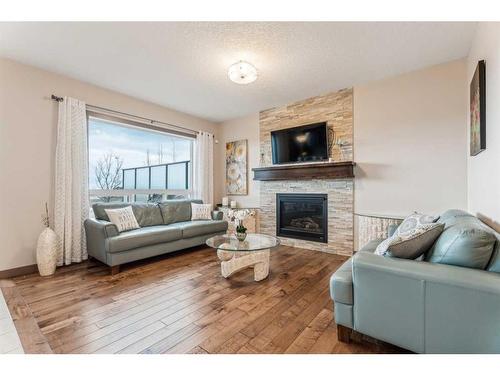 274 Nolan Hill Boulevard Nw, Calgary, AB - Indoor Photo Showing Living Room With Fireplace