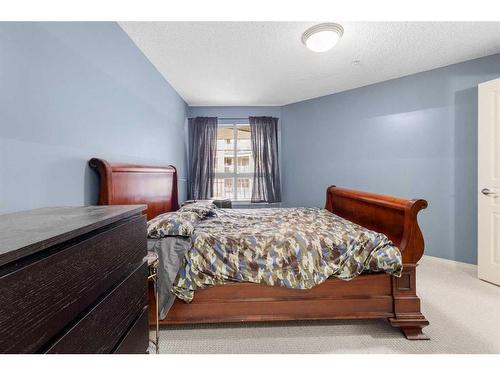 321-5115 Richard Road Sw, Calgary, AB - Indoor Photo Showing Bedroom