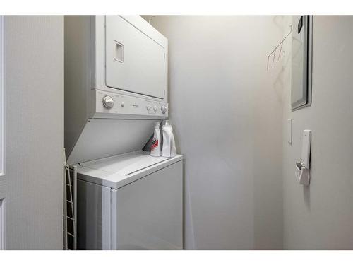 321-5115 Richard Road Sw, Calgary, AB - Indoor Photo Showing Laundry Room