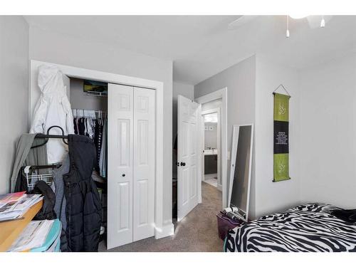 6-7 Westland Road, Okotoks, AB - Indoor Photo Showing Bedroom