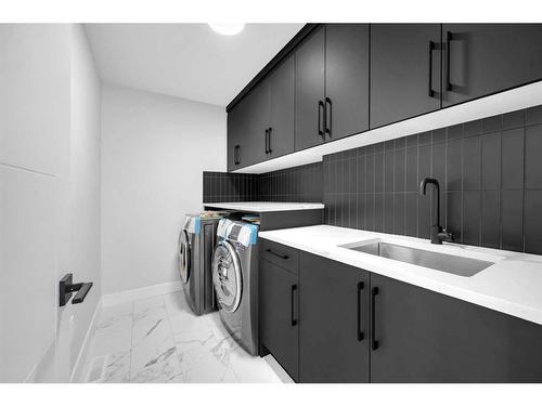 184 Sandpiper Landing, Chestermere, AB - Indoor Photo Showing Laundry Room