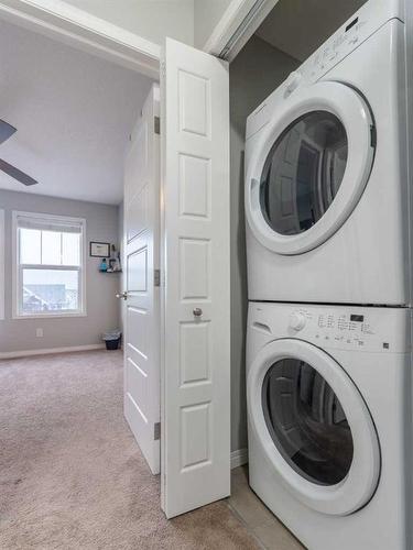 504-280 Williamstown Close Nw, Airdrie, AB - Indoor Photo Showing Laundry Room