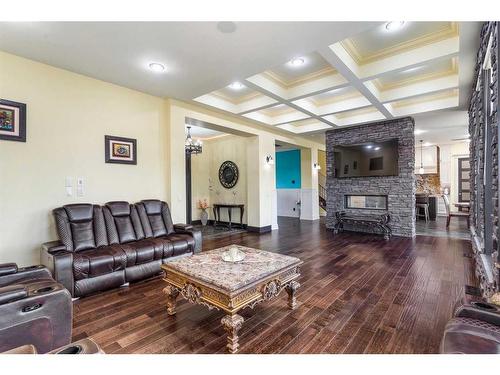 159 Cove Close, Chestermere, AB - Indoor Photo Showing Living Room With Fireplace