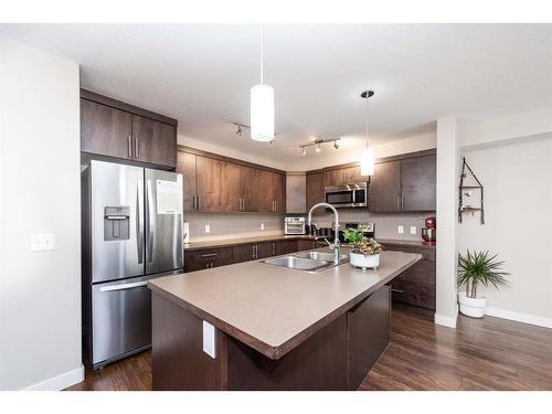 417 Redstone View Ne, Calgary, AB - Indoor Photo Showing Kitchen With Stainless Steel Kitchen With Double Sink