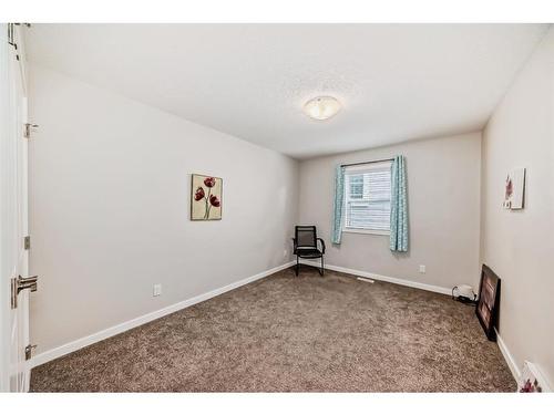 17 Riviera Place, Cochrane, AB - Indoor Photo Showing Other Room