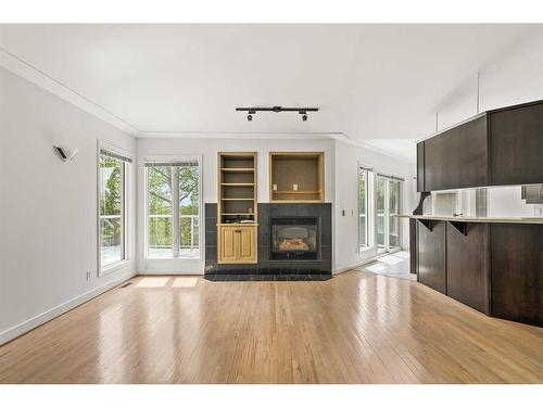 2925 Signal Hill Heights Sw, Calgary, AB - Indoor With Fireplace