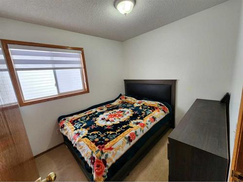 94 Millrise Boulevard Sw, Calgary, AB - Indoor Photo Showing Bedroom