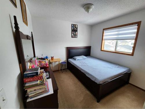94 Millrise Boulevard Sw, Calgary, AB - Indoor Photo Showing Bedroom