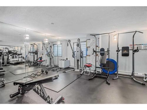 203-9800 Horton Road Sw, Calgary, AB - Indoor Photo Showing Gym Room