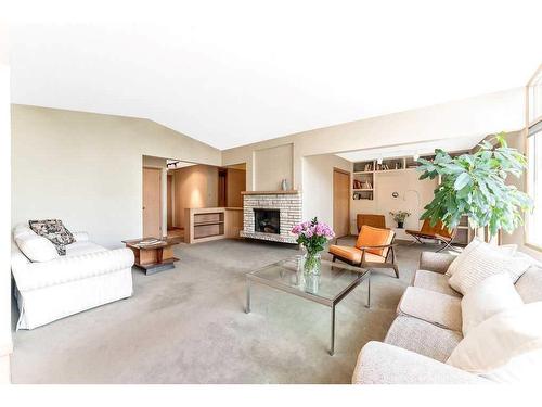 1605 11 Avenue Nw, Calgary, AB - Indoor Photo Showing Living Room With Fireplace