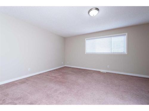 319 Coral Cove Ne, Calgary, AB - Indoor Photo Showing Other Room
