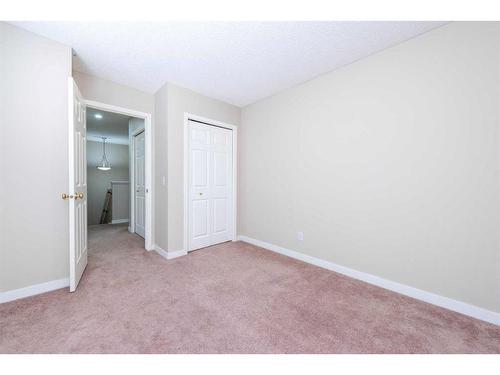 319 Coral Cove Ne, Calgary, AB - Indoor Photo Showing Other Room