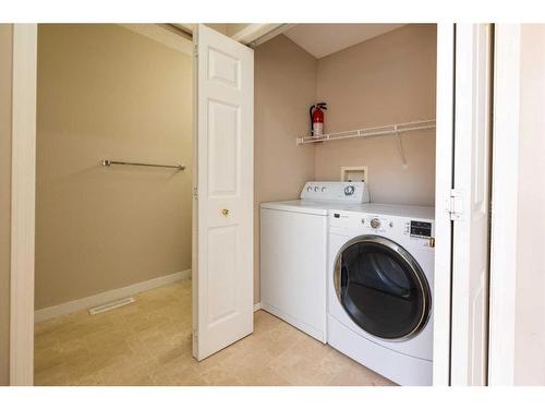 319 Coral Cove Ne, Calgary, AB - Indoor Photo Showing Laundry Room