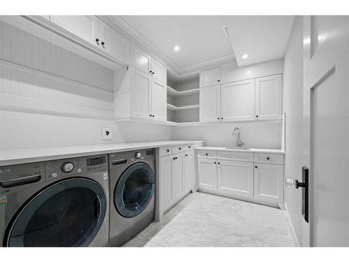 4244 Britannia Drive Sw, Calgary, AB - Indoor Photo Showing Laundry Room