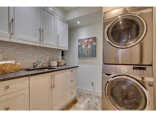 18 Varston Place Nw, Calgary, AB - Indoor Photo Showing Laundry Room