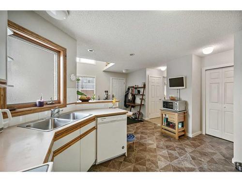 3-2417 28 Street Sw, Calgary, AB - Indoor Photo Showing Kitchen With Double Sink