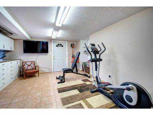 271196 Range Road 13 Nw, Airdrie, AB - Indoor Photo Showing Gym Room