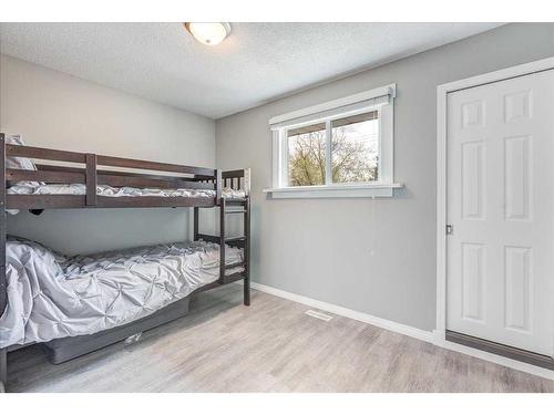 232 Manora Road Ne, Calgary, AB - Indoor Photo Showing Bedroom