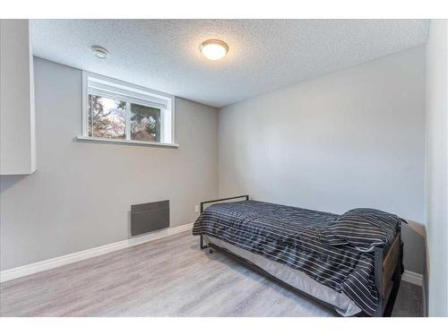 232 Manora Road Ne, Calgary, AB - Indoor Photo Showing Bedroom