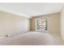 3303-10 Prestwick Bay Se, Calgary, AB  - Indoor Photo Showing Other Room 