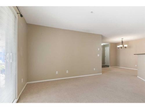 3303-10 Prestwick Bay Se, Calgary, AB - Indoor Photo Showing Dining Room