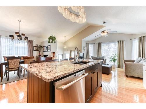 218 Bridlewood Road Sw, Calgary, AB - Indoor Photo Showing Kitchen With Double Sink With Upgraded Kitchen
