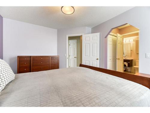 218 Bridlewood Road Sw, Calgary, AB - Indoor Photo Showing Bedroom