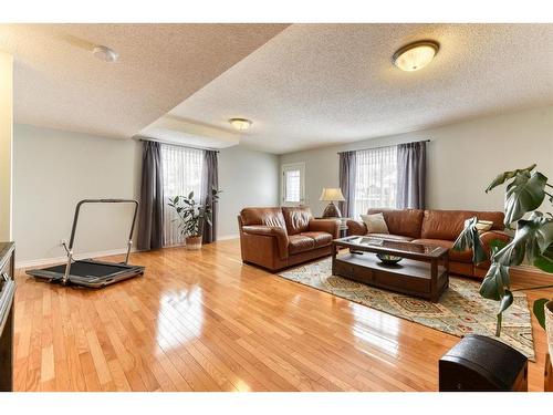 218 Bridlewood Road Sw, Calgary, AB - Indoor Photo Showing Living Room