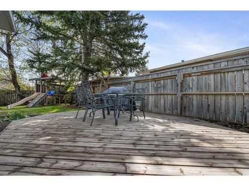 16 Hallmark Place Sw, Calgary, AB - Outdoor With Deck Patio Veranda