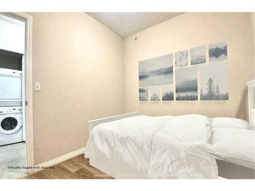 203-325 3 Street Se, Calgary, AB - Indoor Photo Showing Bedroom