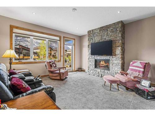 478 Stewart Creek Close, Canmore, AB - Indoor Photo Showing Living Room With Fireplace