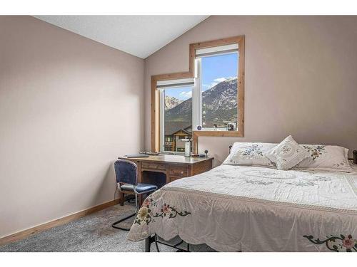 478 Stewart Creek Close, Canmore, AB - Indoor Photo Showing Bedroom