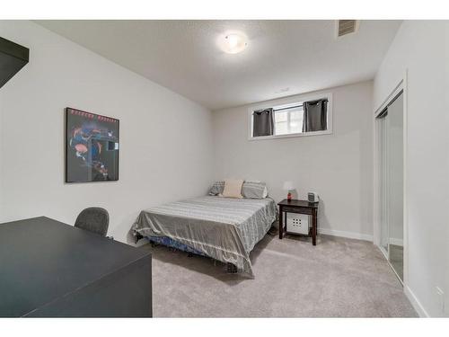 224 Hawkmere View, Chestermere, AB - Indoor Photo Showing Bedroom