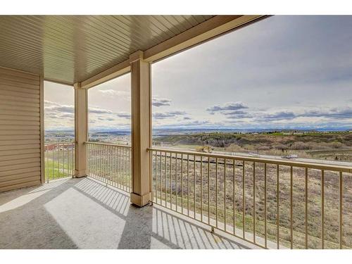 306-207 Sunset Drive, Cochrane, AB - Outdoor With View With Exterior