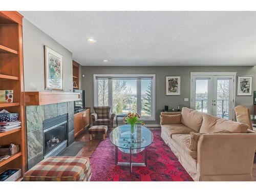 1141 Panorama Hills Landing Nw, Calgary, AB - Indoor Photo Showing Living Room With Fireplace