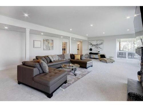 10, 20 --274172 112 Street West, Rural Foothills County, AB - Indoor Photo Showing Living Room With Fireplace