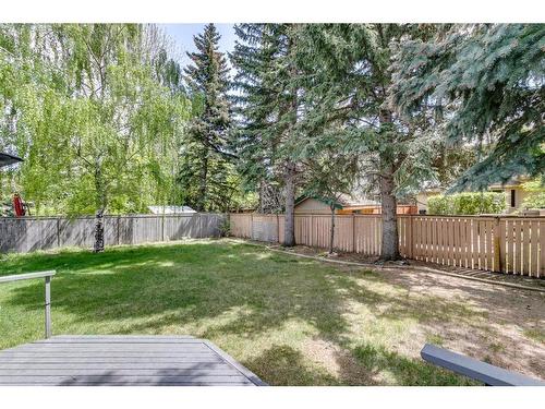 395 Canterville Drive Sw, Calgary, AB - Outdoor With Backyard