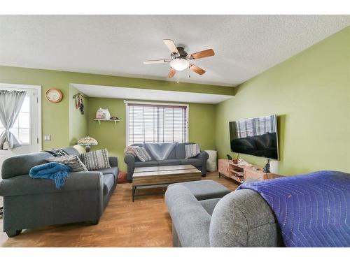 152 Mt Aberdeen Close Se, Calgary, AB - Indoor Photo Showing Living Room