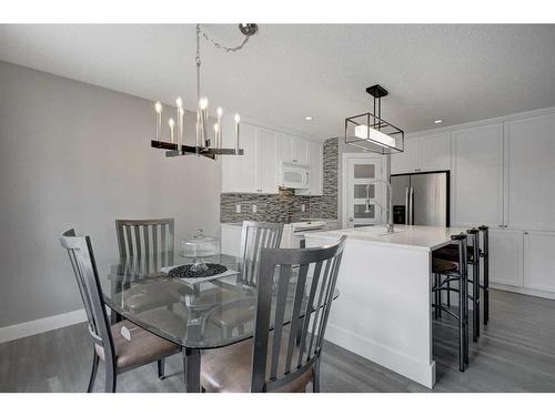1057 Cranston Drive Se, Calgary, AB - Indoor Photo Showing Dining Room